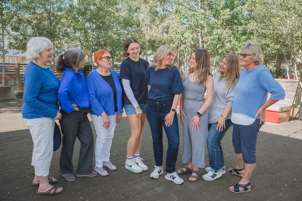 Robyn standing with a group of women